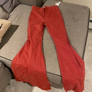 rust orange flared high waisted jeans